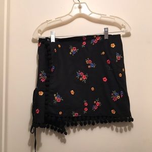 Floral black pom pom skirt